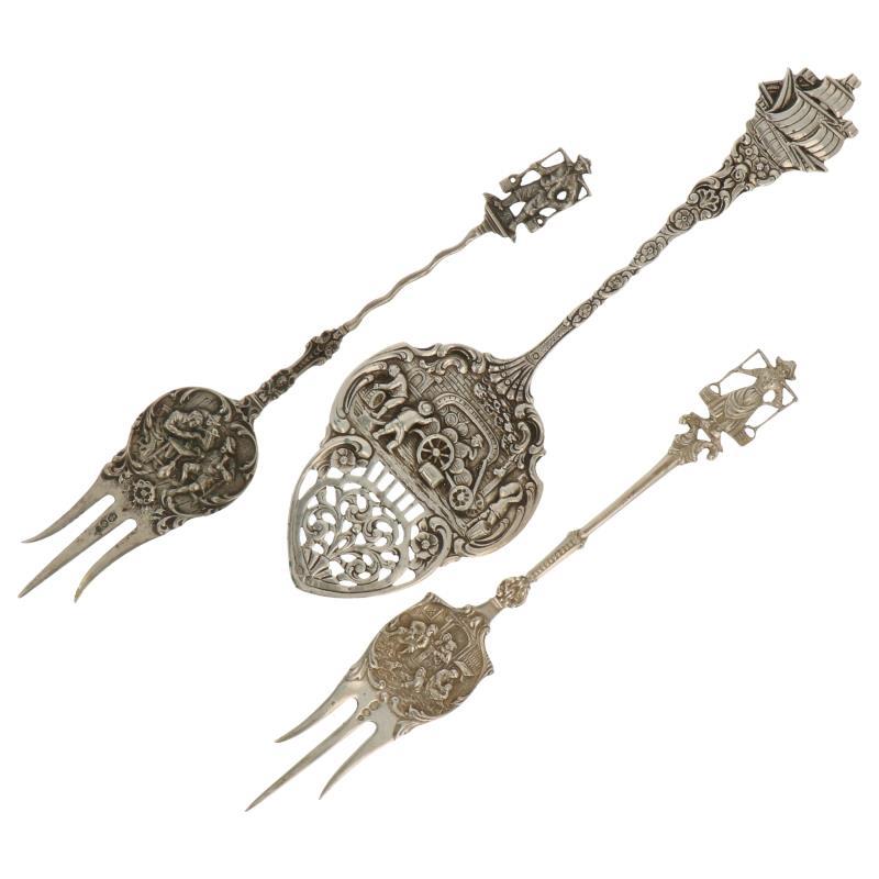 (3) Delig lot met cakevorken en pasteischep gedecoreerd met hollandse decors zilver.
