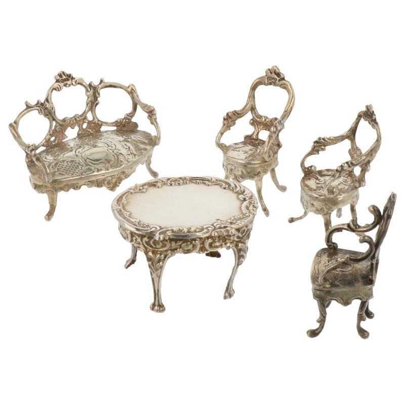 (5) Delig lot miniaturen w.o. tafel, stoelen en bankje zilver.