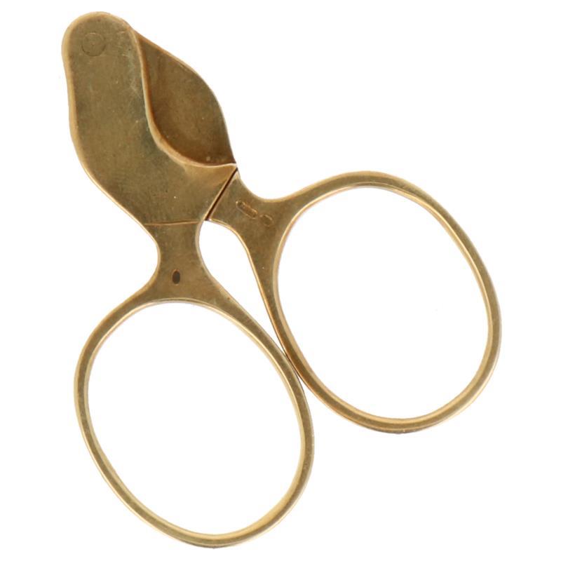 Sigarenknipper 14kt goud glad uitgevoerd zilver.
