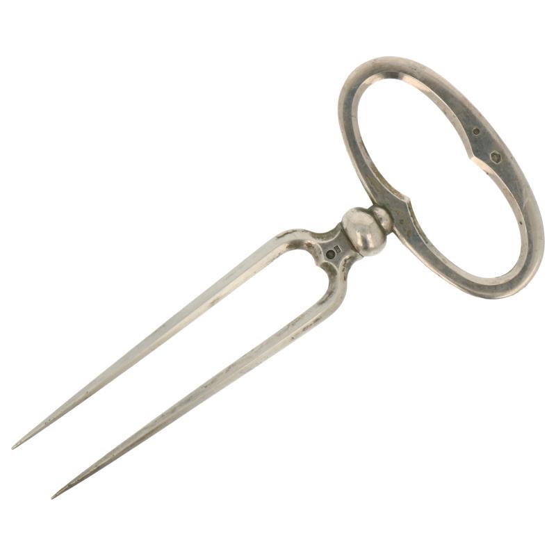 Vlees klauw met bol handvat afgewerkt zilver.