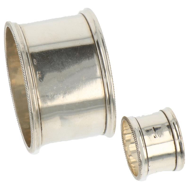 Servetring en vingerdoekring origineel ongegraveerd setje met kabelrand versiering zilver.