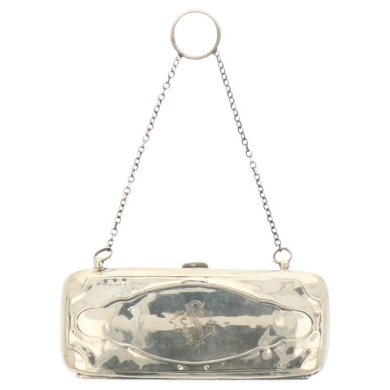 Beursje rechthoekig model met lederen binnenwerk zilver.
