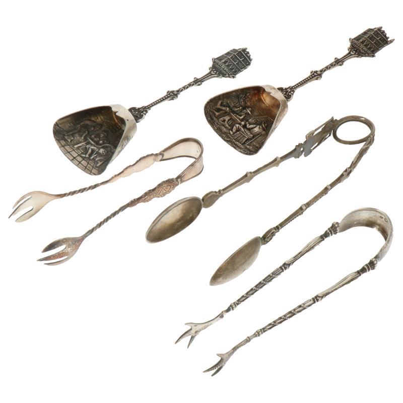 (5) Delig Lot met suikerklont tangen en suikerscheppen zilver.