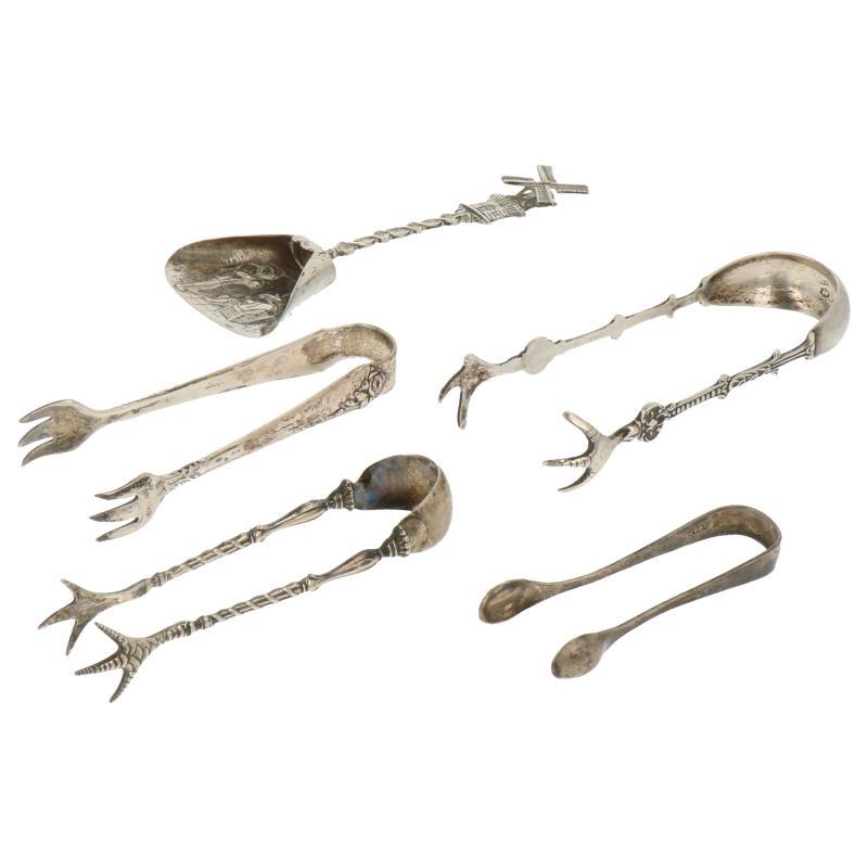 (5) Delig lot met suikerklont tangen en suikerschep zilver.