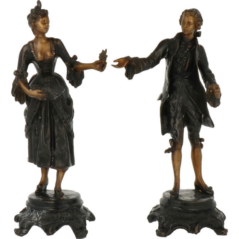 (2x) Bronzen beelden.