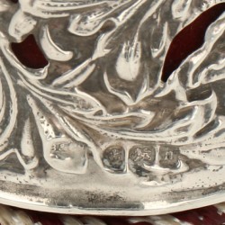 Speldenkussen zilver.