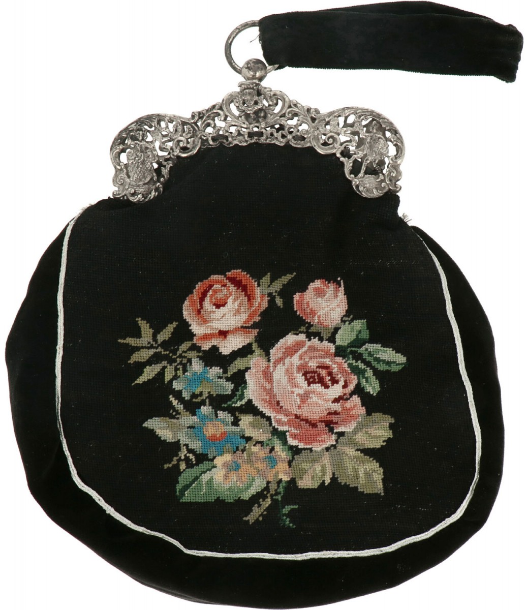 Beugeltas zilver.