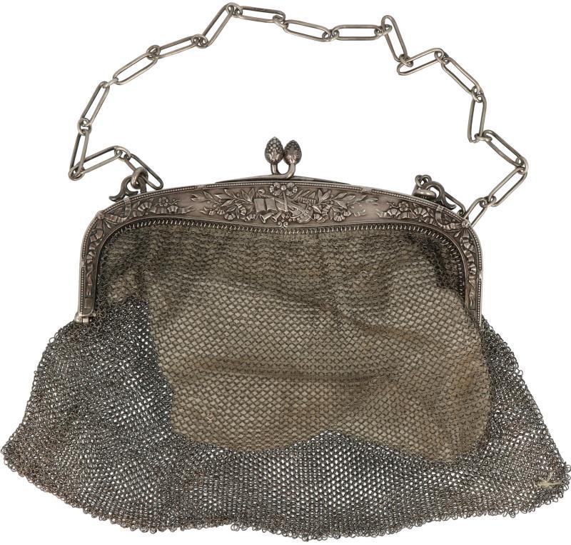 Avondtas zilver.