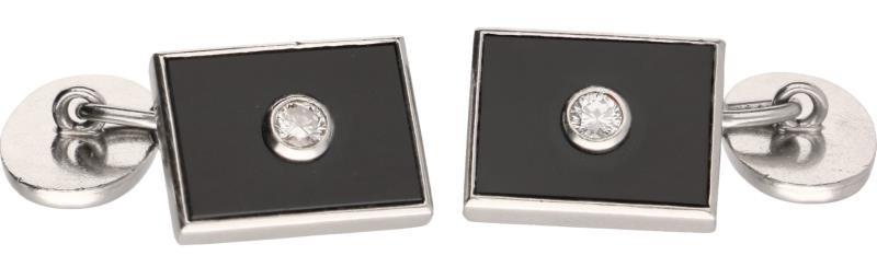 Design heren manchetknopen platina, ca. 0,22 ct. diamant en onyx - Pt 950.