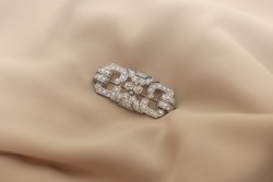 Platina art deco broche bezet met ca. 5.00 ct. diamant.