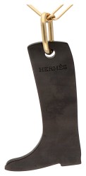 Hermès rijlaars hanger aan verguld collier.