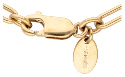 Hermès rijlaars hanger aan verguld collier.