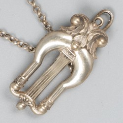 Breipenhouder "sleutel", zilver.