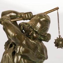 Een bronzen beeld van een man met strijdvlegel, Frankrijk, ca. 1900.