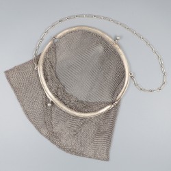 Beugeltas zilver.