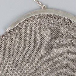 Beugeltas zilver.