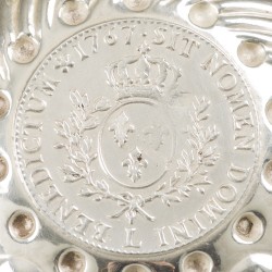 Tastevin zilver.