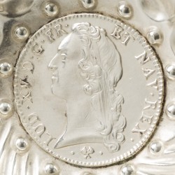 Tastevin zilver.