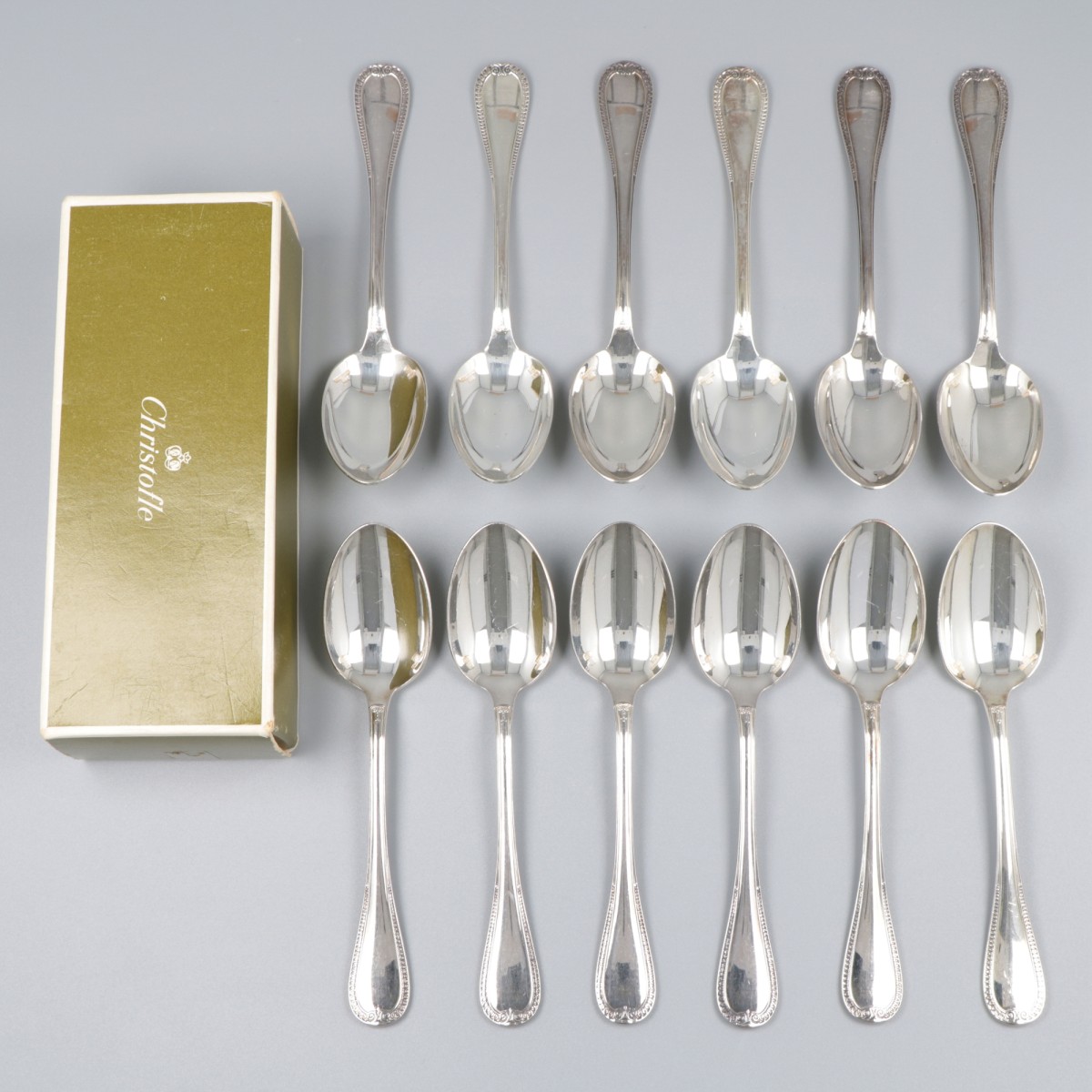 Christofle 12-delige set koffielepels, model Malmaison, verzilverd.