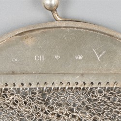 Beugeltas zilver.