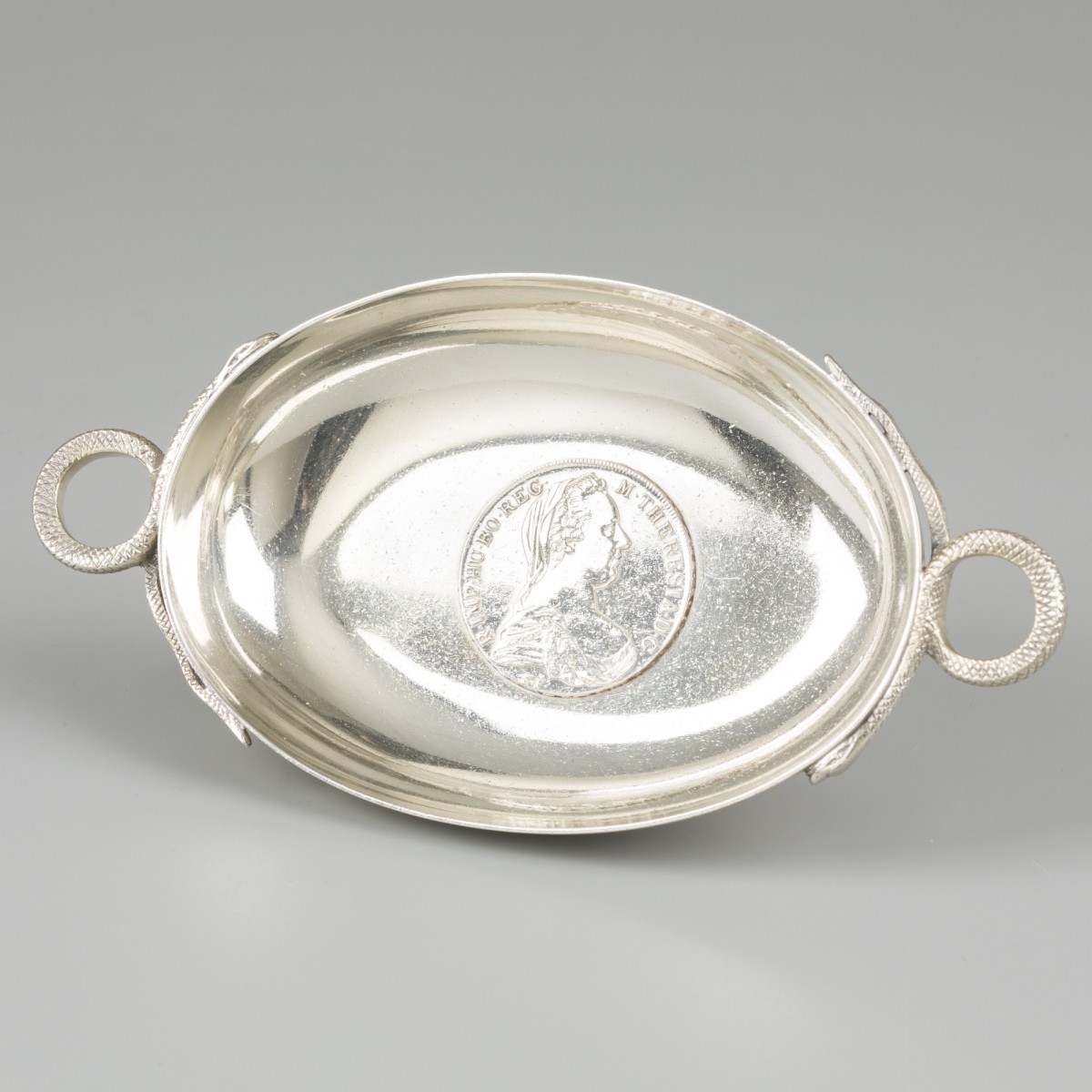 Muntschaaltje zilver.