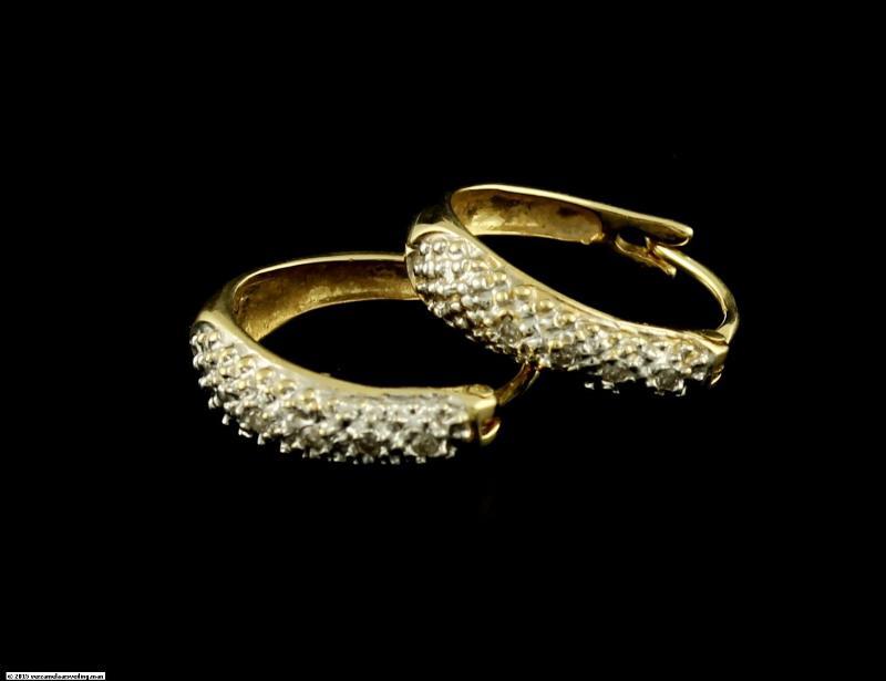 Geelgouden oorbellen bezet met diamanten, 14 karaat