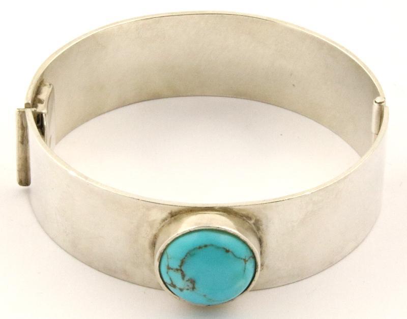 Zilveren slavenarmband bezet met turkoois
