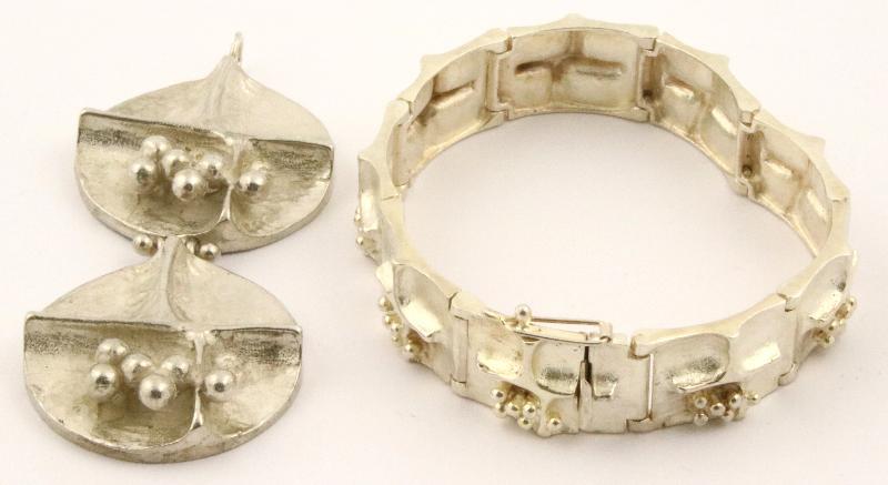 Set van zilveren hanger en armband in modern design