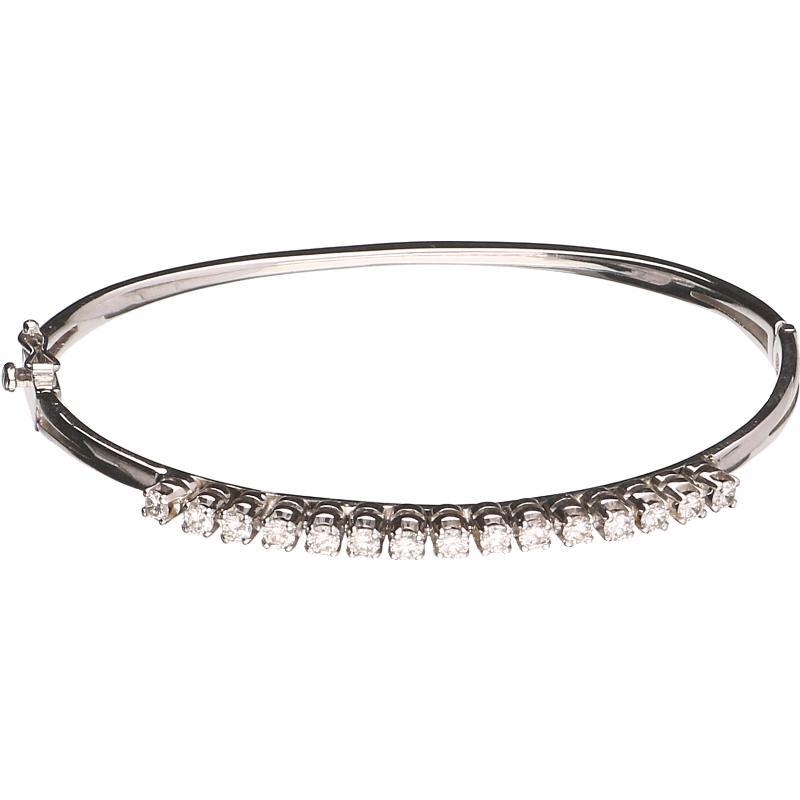 Witgouden slaafarmband  bezet met 15 briljant geslepen diamanten, 14 karaat.