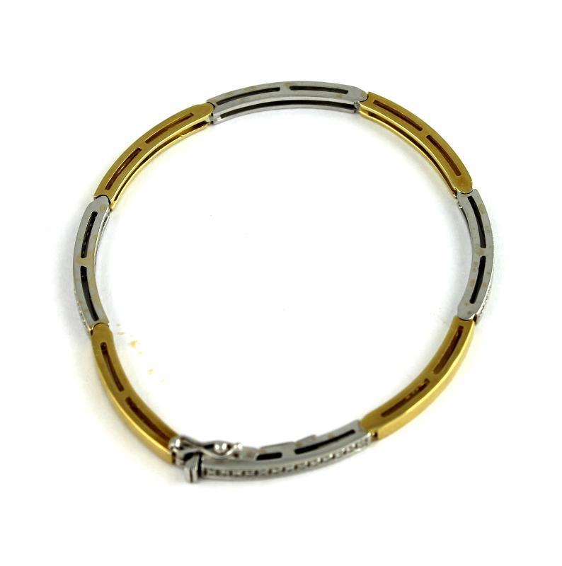 Geel- met witgouden armband bezet met briljant geslepen diamanten, 18 karaat                                                                                                                                                                                   