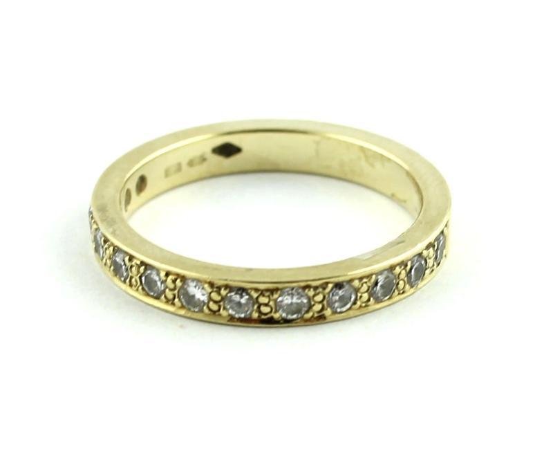 Geelgouden ring bezet met briljant geslepen diamanten, 14 karaat                                                                                                                                                                                               