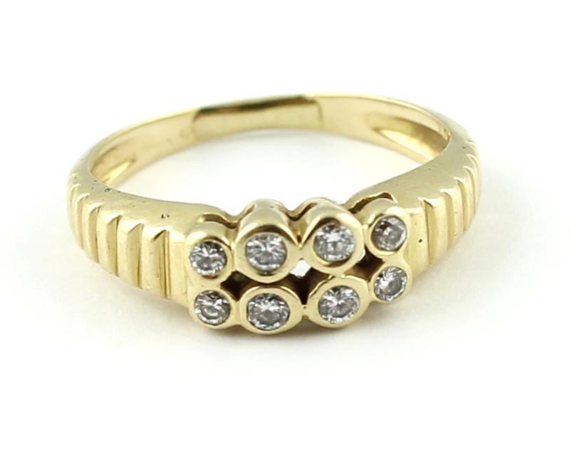 Geelgouden ring bezet met briljant geslepen diamanten, 14 karaat                                                                                                                                                                                               