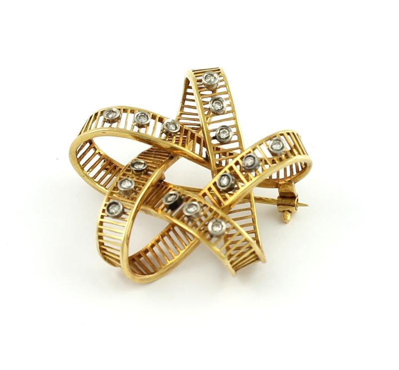 Geelgouden Broche met briljant geslepen diamanten, 18 karaat                                                                                                                                                                                                   