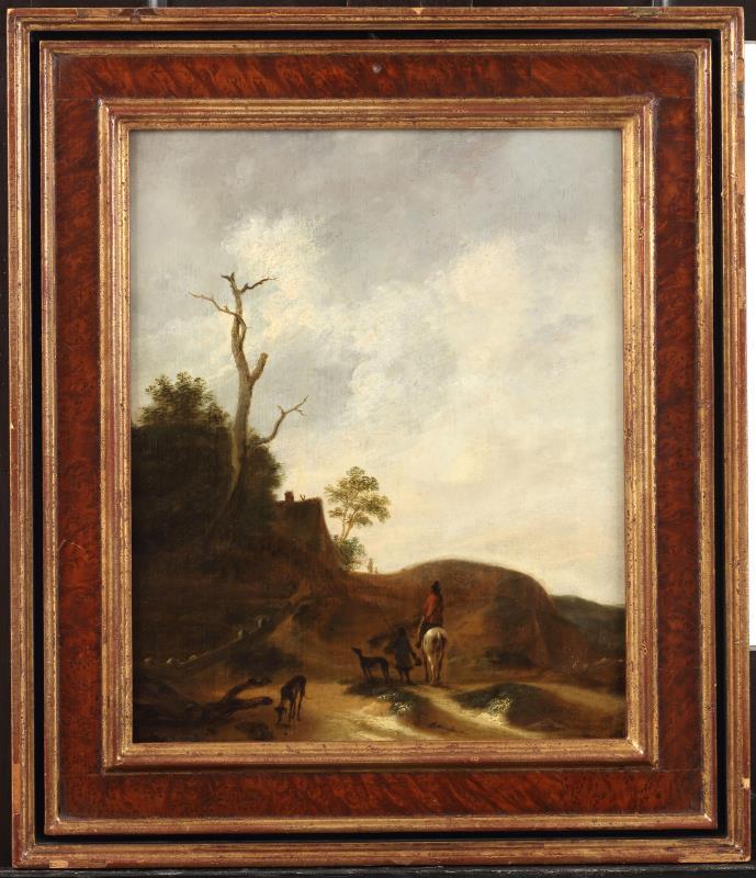 Omgeving Phillips Wouwermans, Een jager met windhonden in een heuvelachtig landschap.