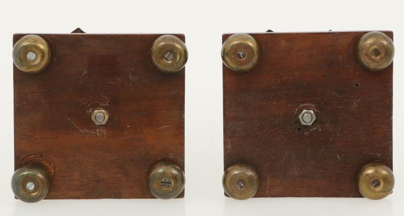 A set with (2) Empire-style candles, mahony and copper, ca. 1900.