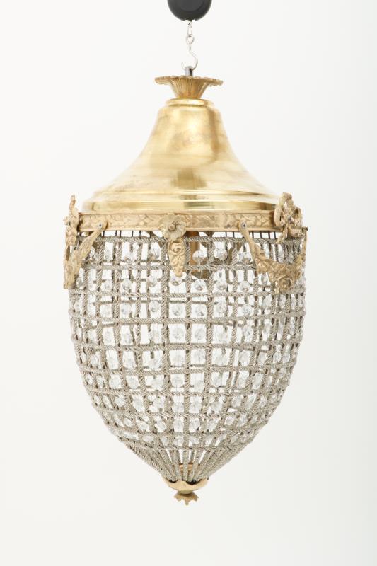 A brass lantern in the shape of a basket-chandelier, after earlier example, late 20th century.