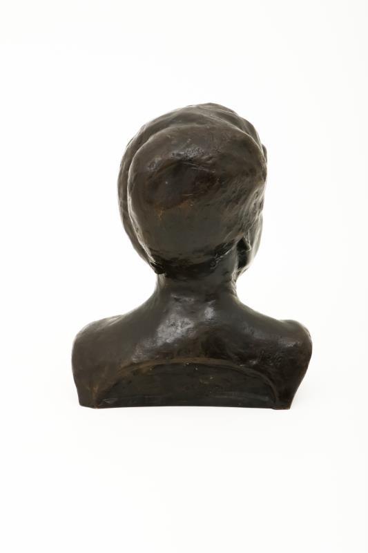Een bronzen buste van een man, gesigneerd Pejé, 20e eeuw.