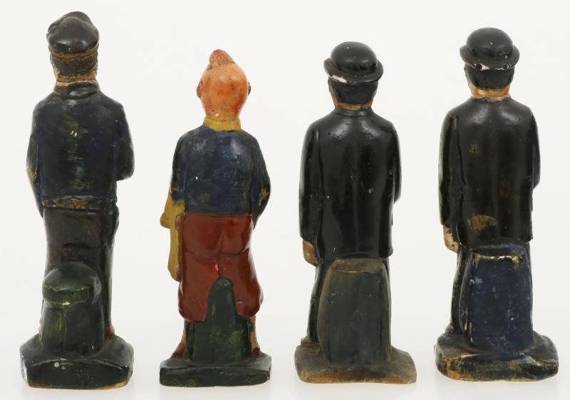 Set van (4) gipsen figuurtjes van Kuifje, Janssen en Janssen en kapitein Haddock, koud geverfd, 20e eeuw.