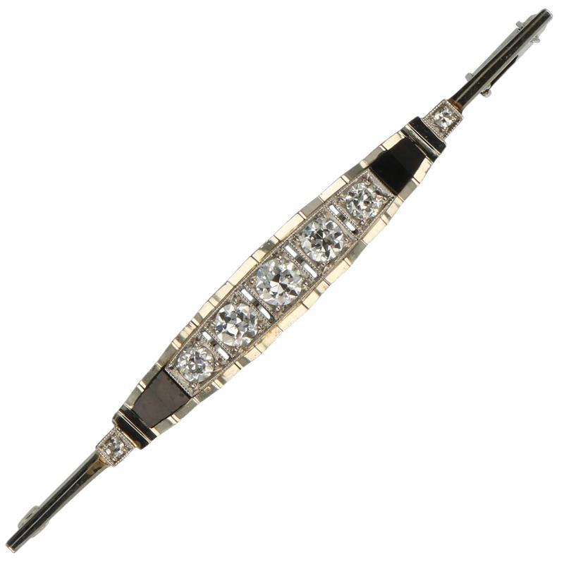 Broche witgoud, ca. 0,74 ct. diamant en onyx - 18 kt.