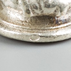 Lakstempel zilver.