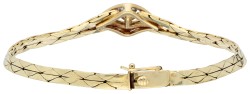 14K geelgouden flexibele armband met diamanten rozet.