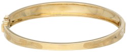 Vintage 14K geelgouden bangle armband met sierlijke gegraveerde details.