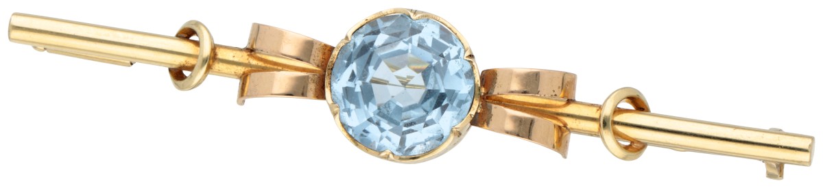 14K Geelgouden staafbroche met synthetische spinel.