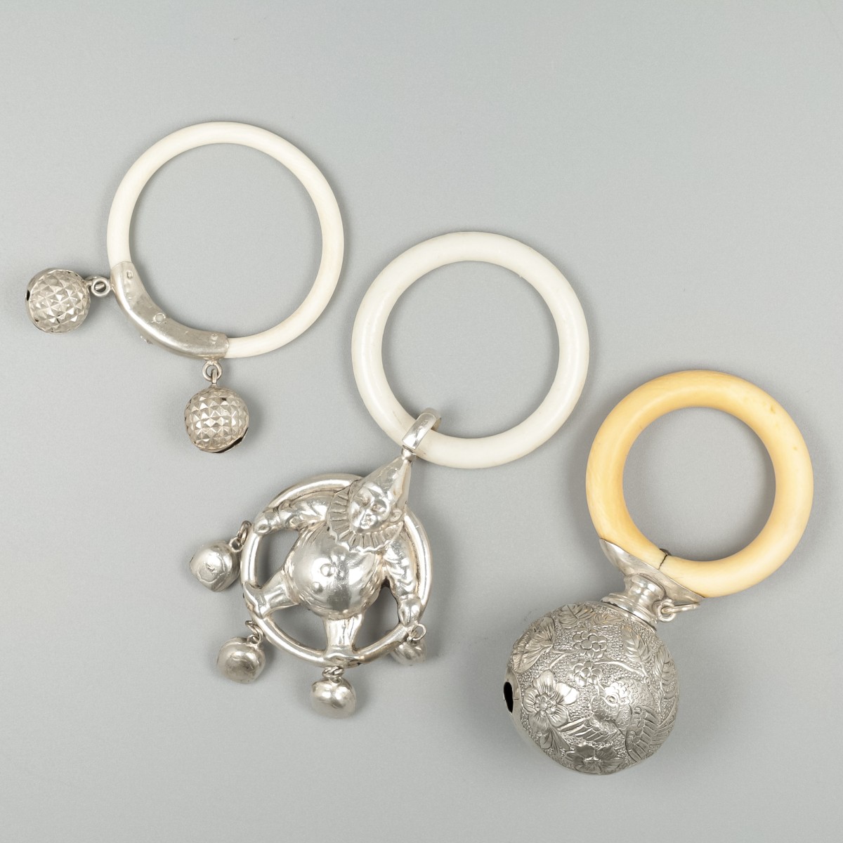 3-delig lot baby rammelaars, zilver.