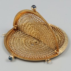 Beugelbeursje goud.