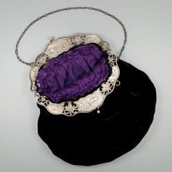Beugeltas zilver.