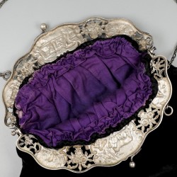 Beugeltas zilver.