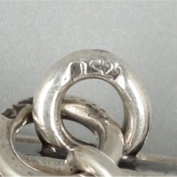 Beugeltas zilver.