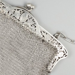 Beugeltas zilver.