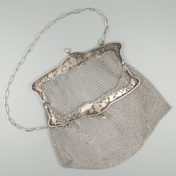 Beugeltas zilver.